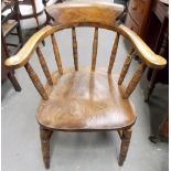 Early 20th Century beech and elm Captain's bow armchair, the back of the elm seat stamped 'J. ODEARL