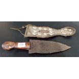 Antique African tribal dagger with carved wood stylised head handle and spade shaped blade and