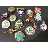 A collection of bowling related enamel badges.