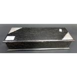 Ebony silver mounted rectangular hinge lidded stationery box, with two silver mounted corners with