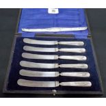 Cased set of 6 silver handled butter knives; together with a silver cone handle