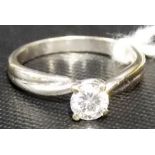 Contemporary 18ct white gold and diamond solitaire ring, the brilliant cut diamond of 0.70 spread