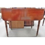 19th Century mahogany Pembroke table with single end drawer and opposing dummy drawer.