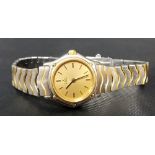 Ebel stainless steel & gold ladies quartz bracelet wristwatch, the gilt dial with baton markers