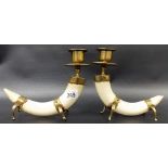 Brass mounted boars tusk pair of candlesticks