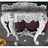 19th Century Burmese carved & pierced wood demi-lune side table, the raised foliate scroll pierced