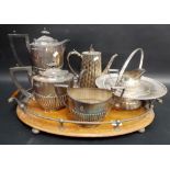 Silver plate inc. a 3-piece half fluted tea set by Walker & Hall & an oak oval twin handled