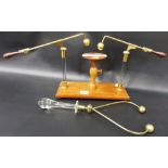 2 early 20th Century brass spark conductor instruments both with glass insulation, 1 on a
