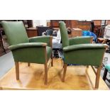 Pair of 1930's green rexine covered oak framed child's armchairs.