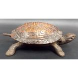 Clockwork cast iron desk bell in the form of a tortoise.