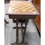 19th Century walnut inlaid rectangular games table, the top with chequerboard inlay upon four turned