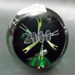 A Caithness glass Limited Edition paperweight 'Millennium Awakening' with bubbled inclusions with