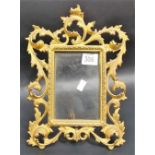 19th Century gilt bronze rectangular picture frame of Rococco design, the frame foliate scroll