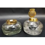 Pair of brass hinge lidded glass ink wells.