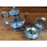 Victorian silver three piece tea set, of baluster form, flower and leaf embossed, maker JA, London