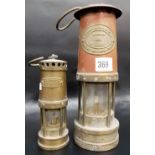 Thomas & Williams Ltd Cambrian brass and copper miners lamp, together with a smaller brass miners