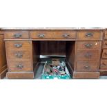 Early 20th Century oak twin pedestal desk, the top with later vinyl writing inset over an