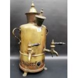 Eastern brass samovar, of cylindrical section with twin carrying handles & 2 taps, height 22.5'