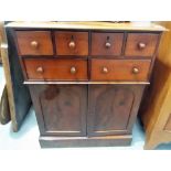 Victorian mahogany music cabinet, the rectangular moulded top over an arrangement of four small