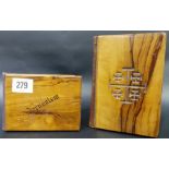 Two Jerusalem Olive wood religious books.