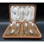Silver box set of six teaspoons and sugar tongs, Birmingham 1924, weight 3oz approx.