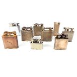 Smoking interest; collection of Dunhill swing arm lighters, including miniature 3.2cm, (9)