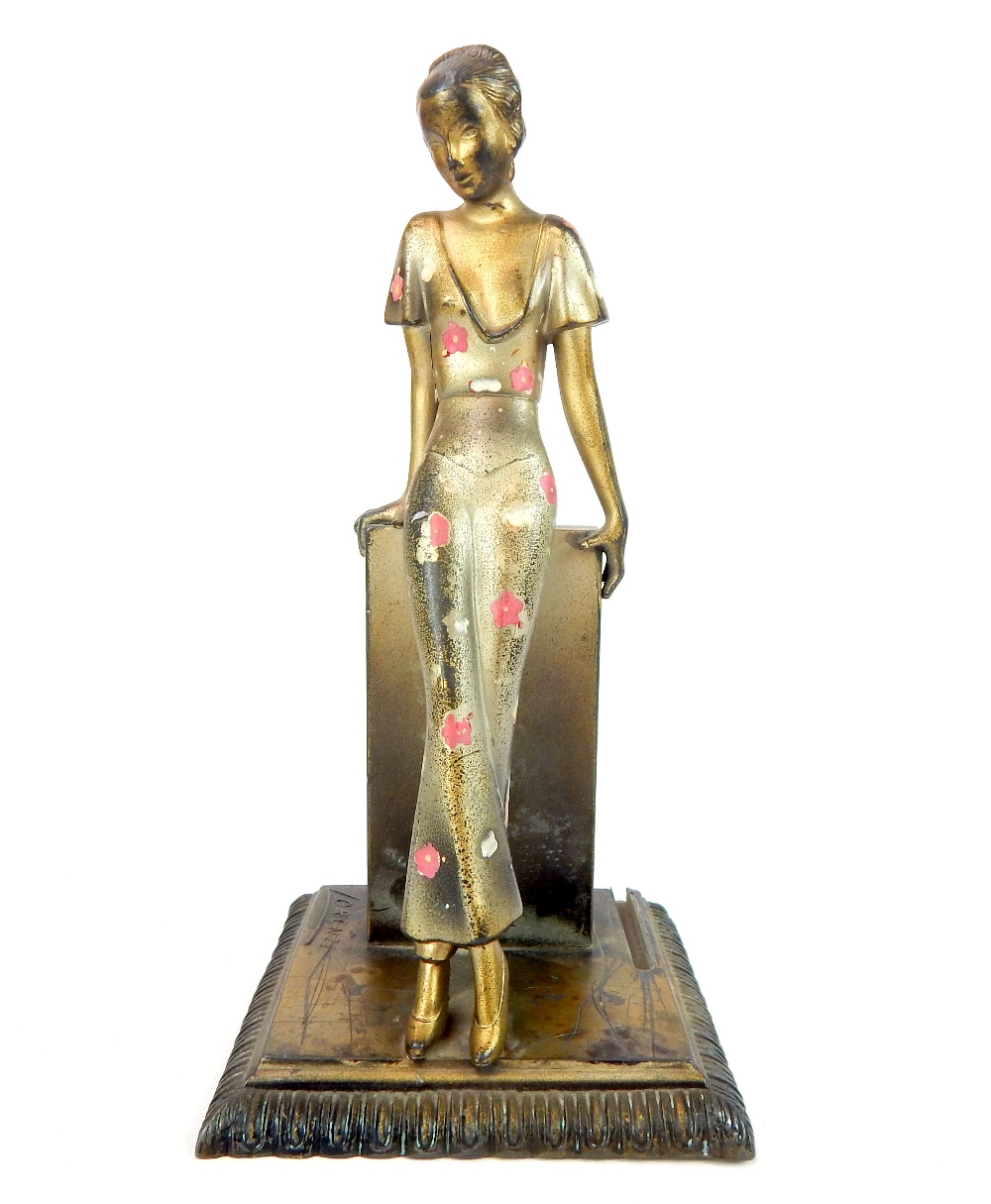 Austrian match striker, marked ANR, with girl figure in the style of Lorenzl, c.1930, approx 20cm h