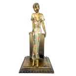 Austrian match striker, marked ANR, with girl figure in the style of Lorenzl, c.1930, approx 20cm h