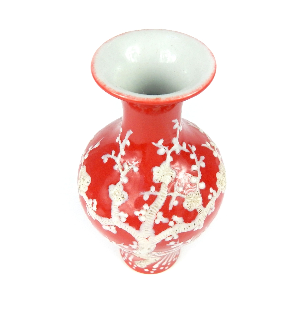 Chinese baluster vase everted rim, red glaze with white overlay of flowering prunus tree, six blue - Image 2 of 4