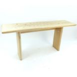 A contemporary limed oak fold over trestle style dining table, 159 x 80cm