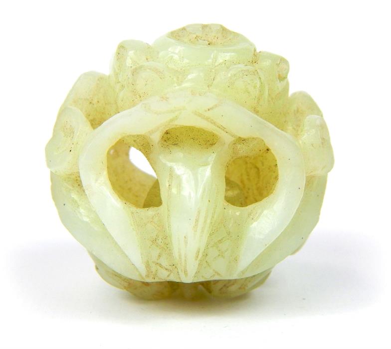 An early 20th century Chinese carved jade concentric ball