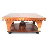 An Edwardian copper cooking / warm tray, of rectangular shape with shaped apron, raised on four