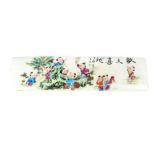 Chinese ceramic paperweight, scene of children playing, inscription to top, pierced grill to ends,