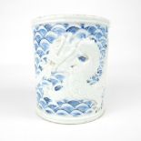 Chinese ceramic brush pot, blue & white glaze with applied dragon over the waves, impress