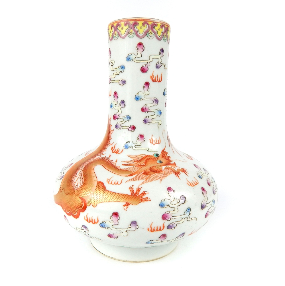 Chinese ceramic onion vase, red gilded dragon chasing a golden flaming pearl among polychrome