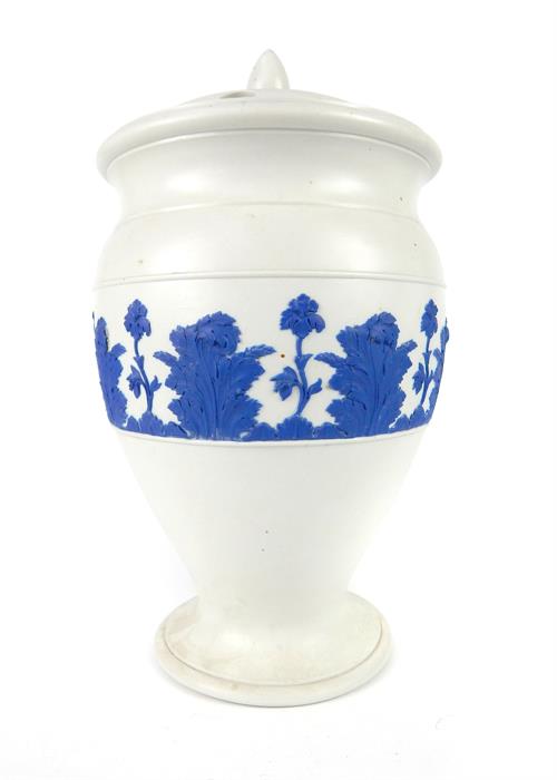 A 19th century white and blue Wedgwood Jasperware storage jar, floral decoration, 32cm high, bearing