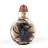 Chinese Peking glass snuff bottle, clear glass with black overlay of bats & pomegranates, 7cm h