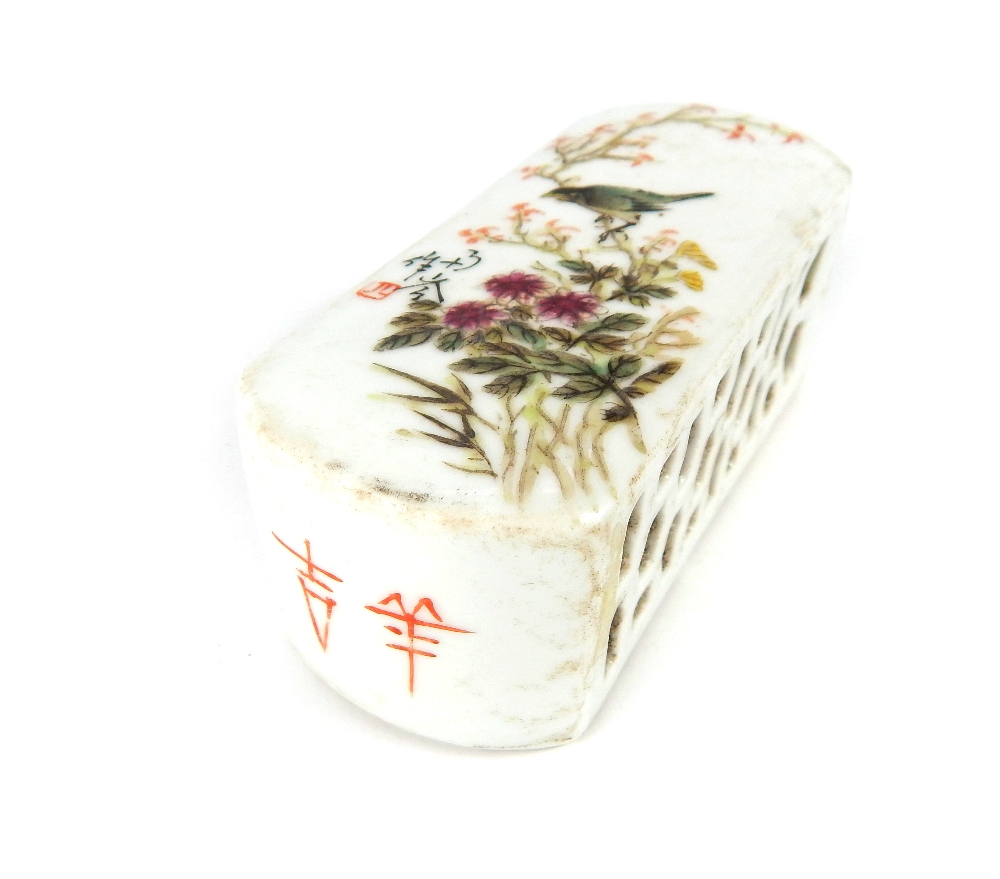 Chinese ceramic paperweight, bird in tree decoration with inscription, grill to flanks, void