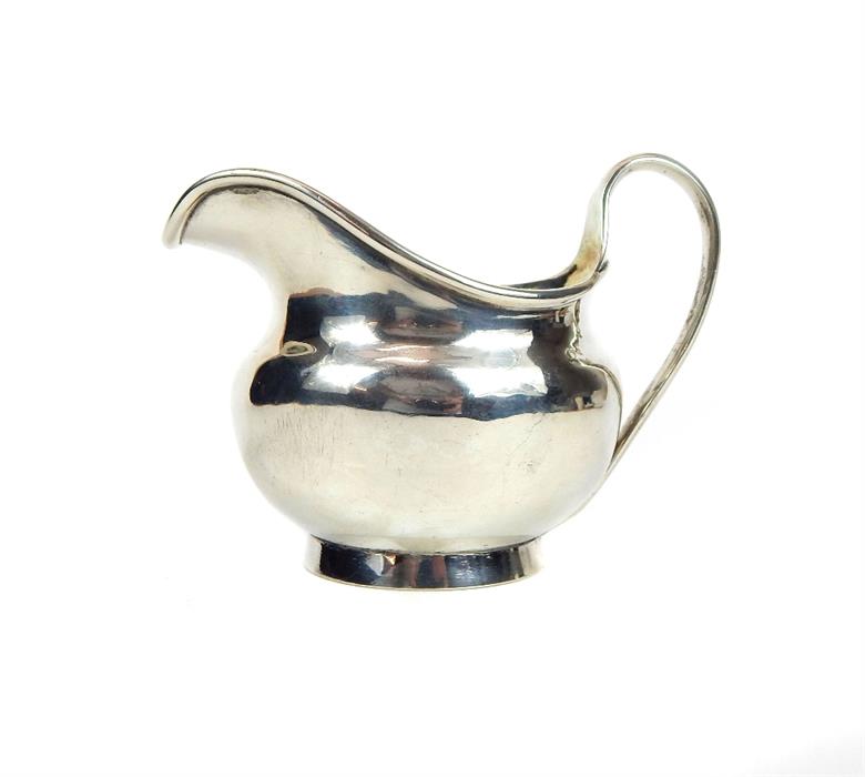 A Georgian silver cream jug