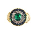 An antique gold diamond and large emerald dress ring.