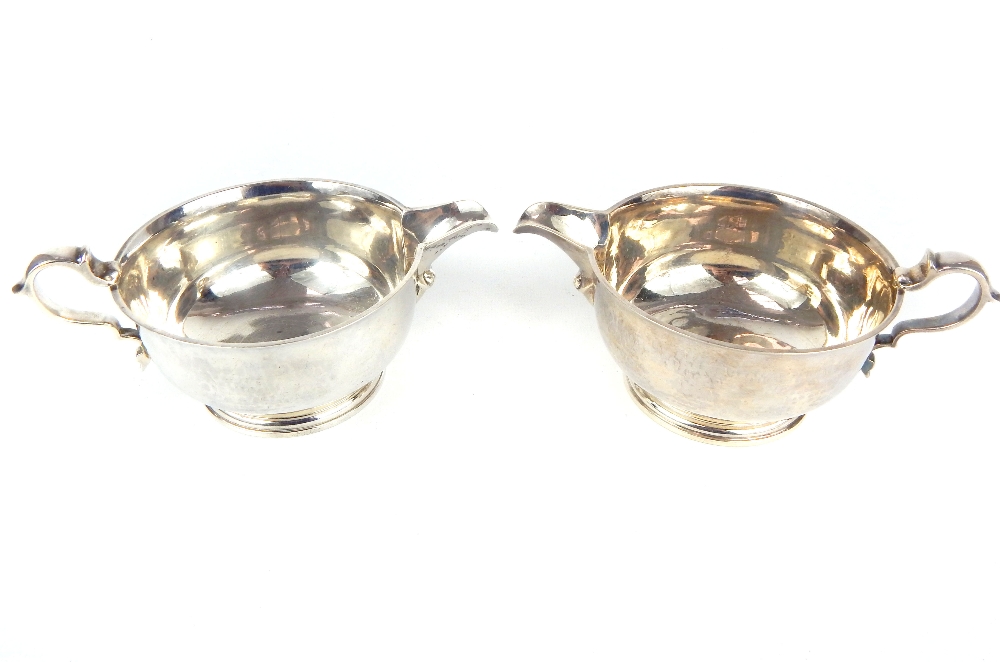 A pair of hallmarked silver cream jugs - Image 2 of 9