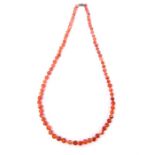 A spherical carnelian bead necklace