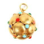 An Italian 18 ct gold "Charm" spherical pendant.