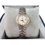 Longines ladies stainless steel wristwatch, gilt winder, bezel batons & hands, date aperture,