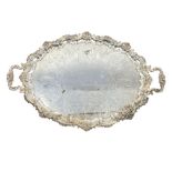 A large silver twin handle tray with ogee scrollin