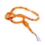 Deep-coloured amber prayer beads