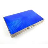 An Asprey & Co Ltd silver and blue enamel box