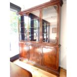 Early 20thC glazed bookcase in the manner of Gillo