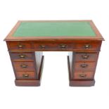 Early 20thC mahogany twin pedestal desk, copper Art Nouveau handles to 9 drawers, 68x 106x 60cm