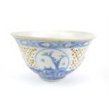 Chinese 19thC rice cup, blue & white glaze with panels of landscapes interspersed with pierced work,